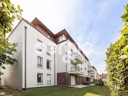 appartement de 2 pièces de 50m² et garage en sous-sol