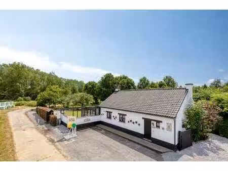maison rénovée avec jardin et garage à drieslinter
