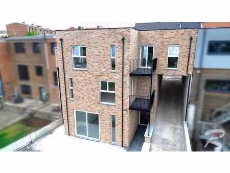 appartement neuf (tva 6%) - 1ch - parking - cave - terrasse