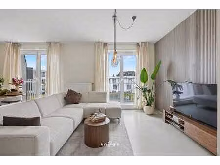 appartement récent avec 2 chambres et terrasse au centre de