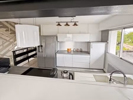 maison de ville de 106 9 m² avec bel espace de vie  3 chambres  terrasse et véranda au...