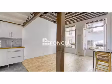 paris iii – rambuteau / quincampoix – 2 pieces traversant en bon etat avec charme de l’anc