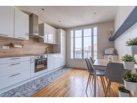 appartement 3 pièces de 52 m² à courbevoie - gare becon les bruyères
