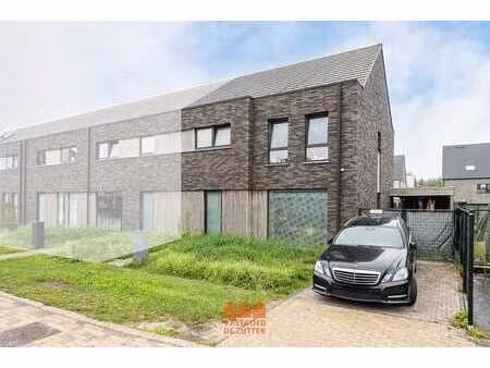 recente halfopen gezinswoning met zuidgerichte tuin