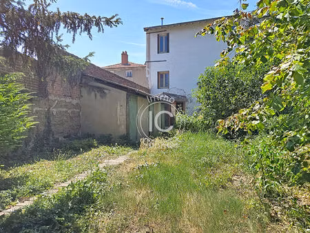 maison de ville avec jardin et garage - fort potentiel d'aménagement