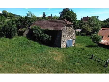 très bel ensemble en ségala : grange  séchoir et hangar  sur 4600m²