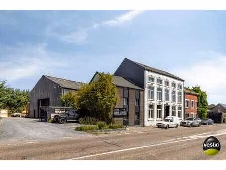 opbrengsteigendom van bureel  woning  magazijn en 2 appar...