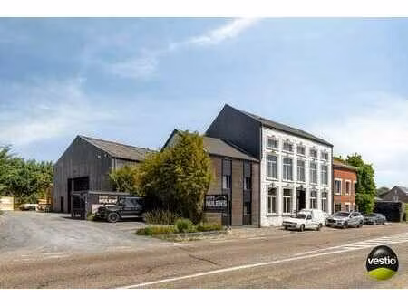 woning met burelen en magazijn te tongeren langs n79.
