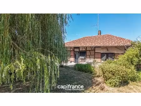 beaupont (01270)  maison bressane de plain-pied à colombages d’environ 94 m² habitables  s
