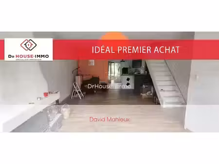 maison de ville en brique de 103 m² - jardin exposé sud-ouest - secteur recherché.