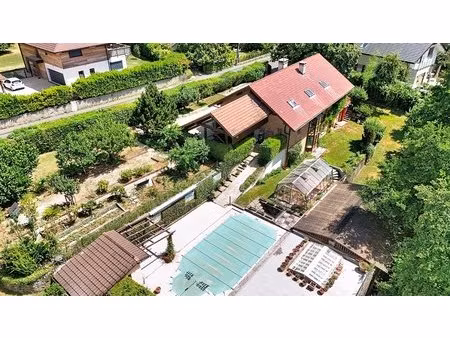 divonne les bains – maison de caractère avec piscine et fort potentiel