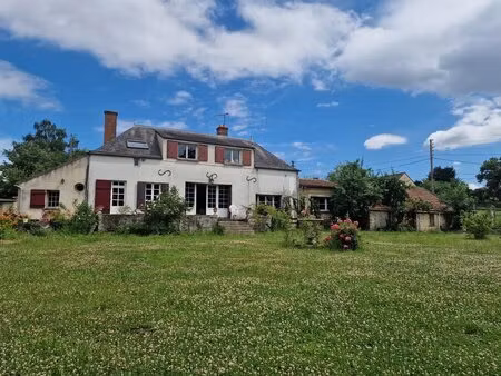 ensemble immobilier de caractère sur un parc arboré de 5 000 m² constructibles