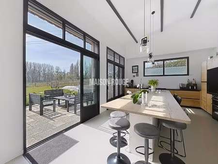 maison d'architecte - vie de plain-pied  dpe a et vaste pièce de vie de 65 m² !