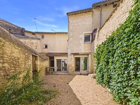 maison de 164 m 2 à mirebeau   4 chambres  cour  garage  caves