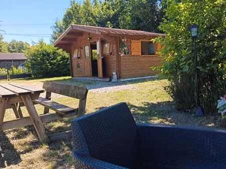 terrain de loisirs   avec chalet et étang de pêche