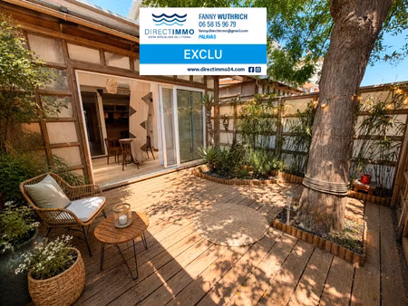 rez de jardin: f2 traversant avec veranda  double terrasse e