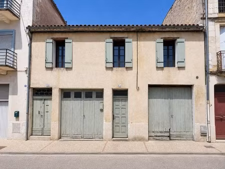 maison de ville 90 m² – grand séjour avec mezzanine – 2 chambres – deux garages et cave – 