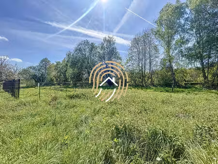 terrain viabilisé avec cadre verdoyant