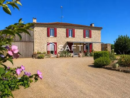 grande maison en pierre de 185 m² avec logement indépendant  dépendances et environnement 