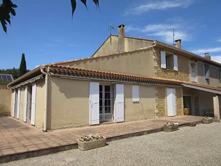 maison poutre et pierre à sauveterre sur une parcelle de terrain de 1850 m2 avec garage et
