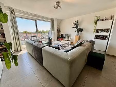 ruim duplexappartement met dubbele garage te kachtem.