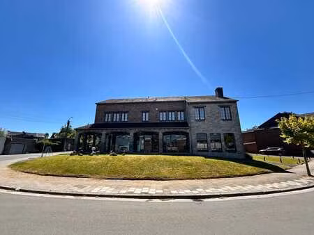maison avec surface commerciale au rdc