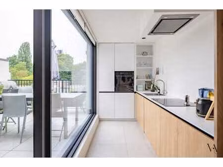 exclusief triplexappartement met 4 slaapkamers in gerenov...