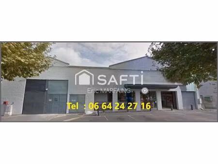 local + stockage + 17 garages en cœur de ville
