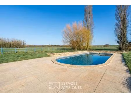 ancien corps de ferme avec piscine au coeur de la nature