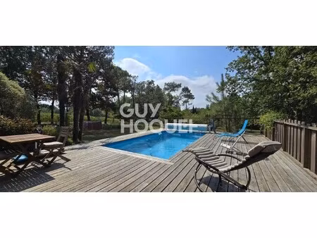 havre de paix à poyartin : maison d'architecte avec piscine  boulodrome et jardin paysager