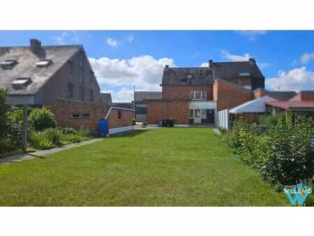 maison 3 façades avec garage et beau jardin à herent
