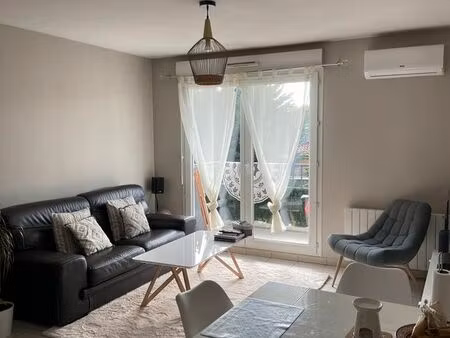 t3 59 m² avec garage  balcon et ascenseur