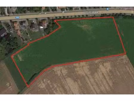 landbouwgrond van 255 a 64 ca – langs de provinciebaan te...
