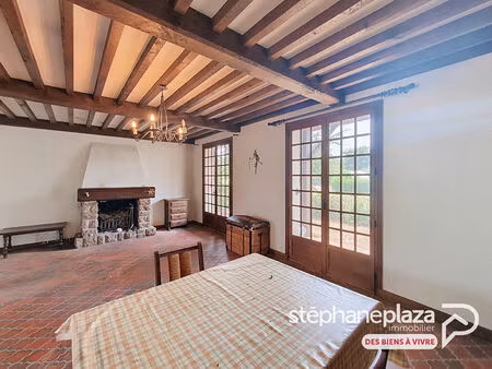 maison de plain-pied à rénover de 81m²  2 chambres + 1 bureau  2 garages avec jardin au ce