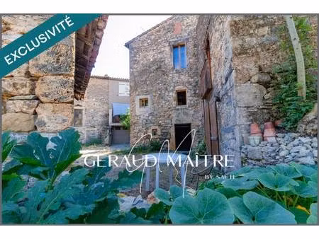 maison de village avec cour  garage et gros potentiel
