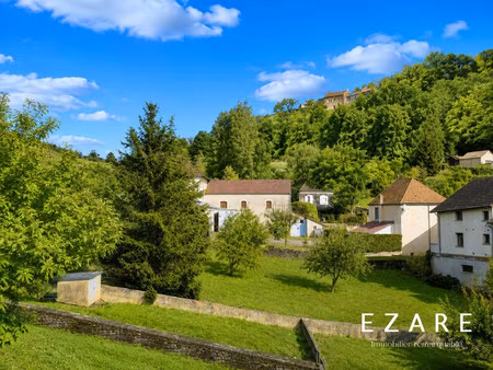 saint-romain : terrain constructible avec vaste verger