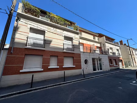 à vendre  appartement 3 pièces de 57 34 m² avec balcon  terrasse  parking et ascenseur