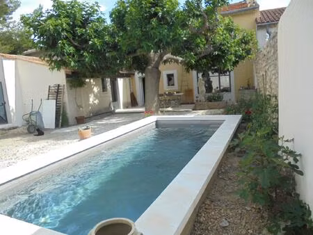 bien vendu eyragues - maison de village avec exterieur et piscine - terrain de 292 m2
