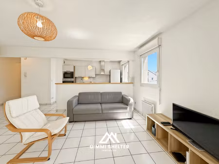 appartement t2 de 56 m2 avec parking  cave et terrasse à cle
