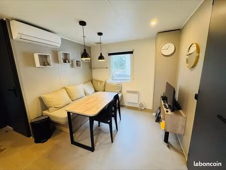 mobil home à vendre avec jacuzzi  cuisine extérieure et golfette