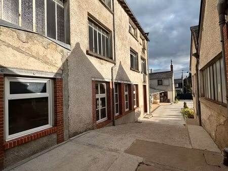 entrepôt + immeuble