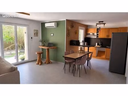 appartement t2 de 57 m² avec jardin  garage  cave et parking