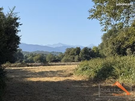terrain 4380 m² boussens