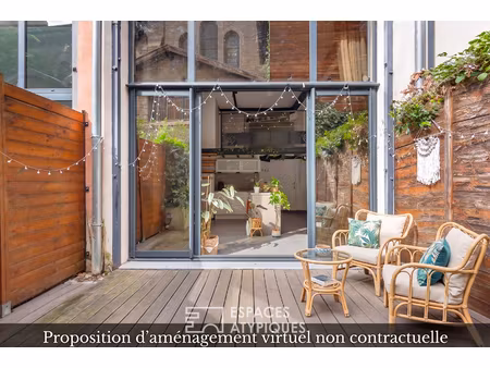 loft avec terrasse dans un ancien atelier