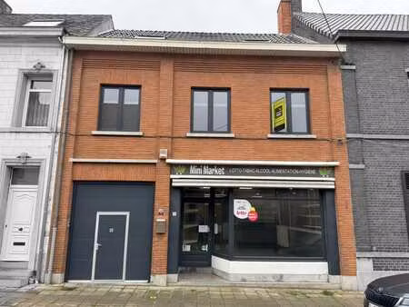 bâtiment mixte (commerce et appartement )