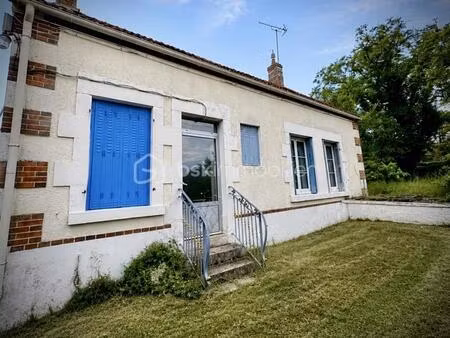 maison de village avec jardin et garage : un fort potentiel à petit prix