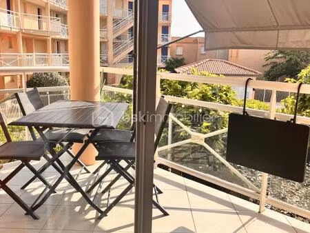 appartement face à la plage de valras avec piscine et place de parking privative