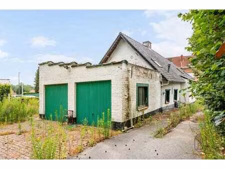 charmante fermette à rénover avec jardin  double garage et f