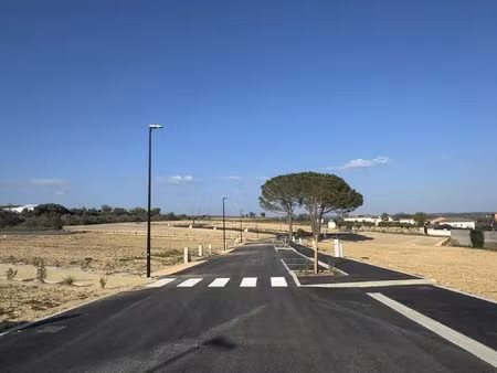 terrain constructible viabilisé 350m² en lotissement - village