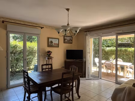 cremieu centre appartement rdj 70 m² avec terrasses  garage et cave